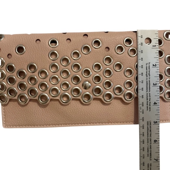 Sondra Roberts Stylish Light Pink Clutch with Grommet Design - Picture 9 of 9